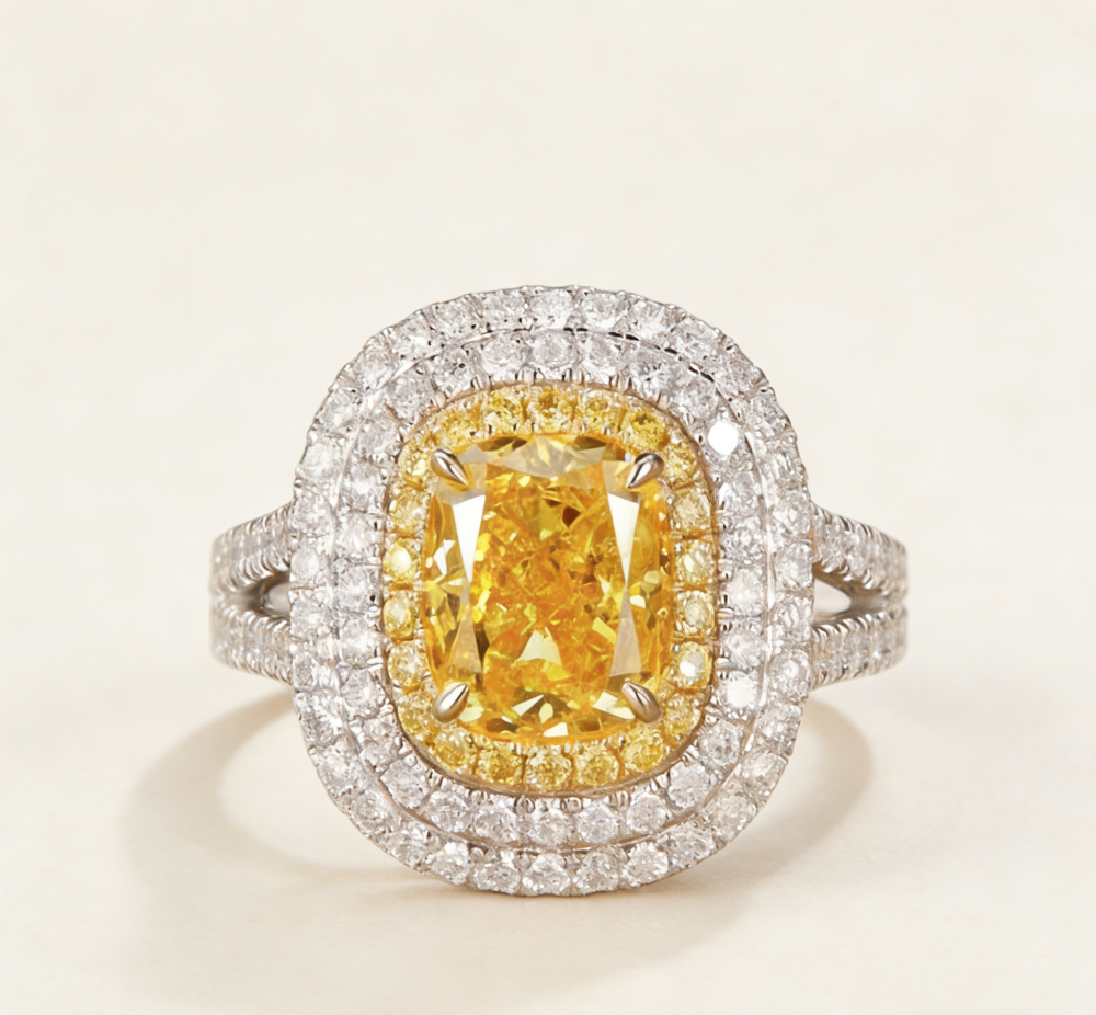 A cushion-shaped, richly colored yellow diamond ring
