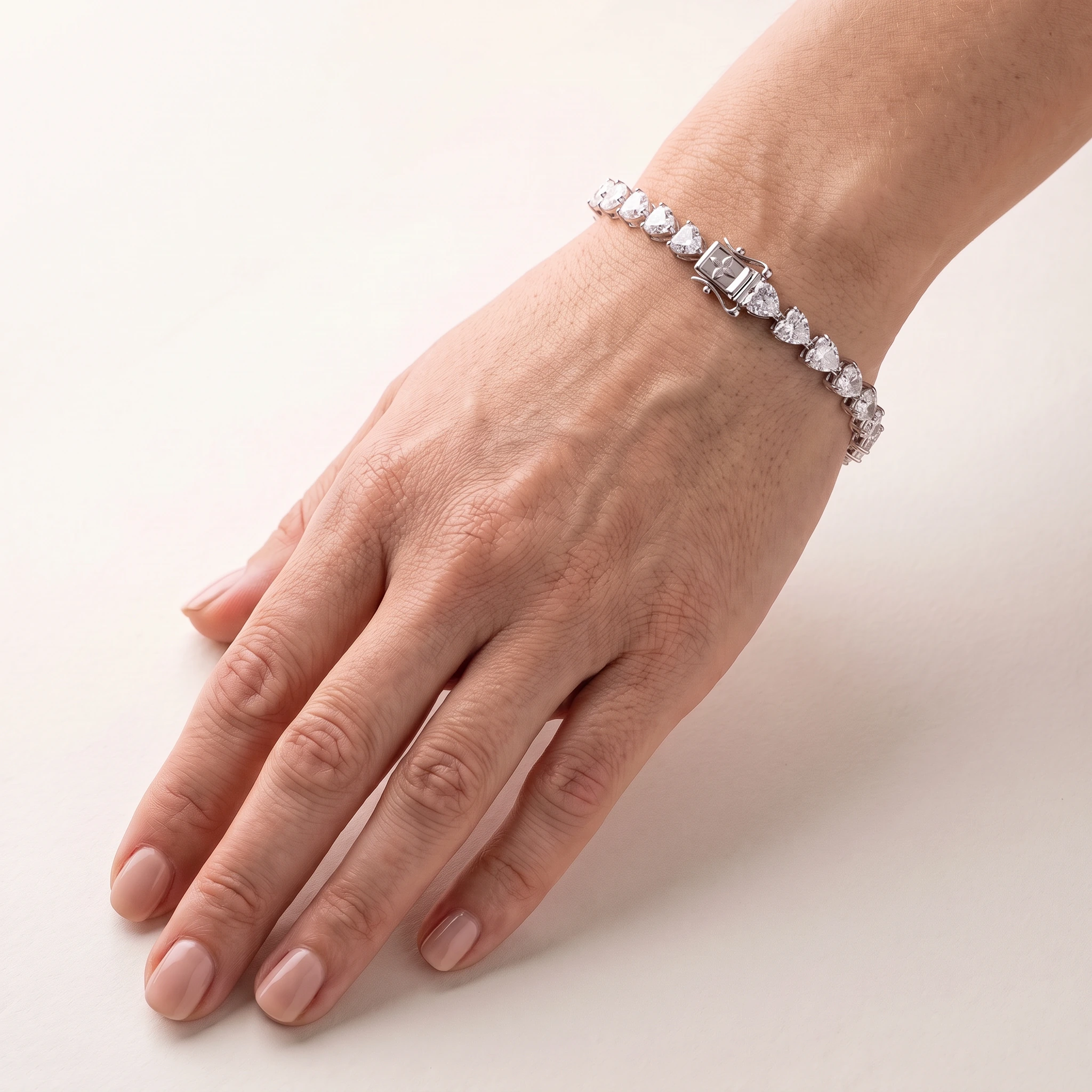 Heart-Shaped Lab-Grown Diamond Tennis Bracelet — worn on an adult wrist; AI-generated style illustration